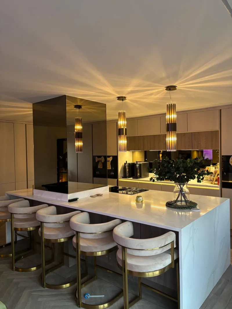 Luxury kitchen island with gold pendant lights by AG Joinery Blackburn
